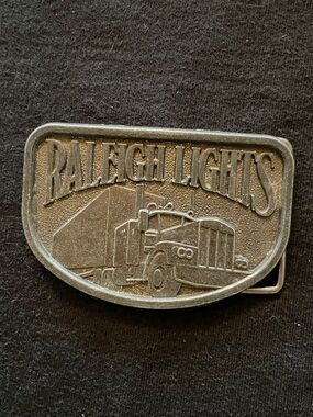 Vintage Raleigh Lights Truck Belt Buckle - Brass Silver tone